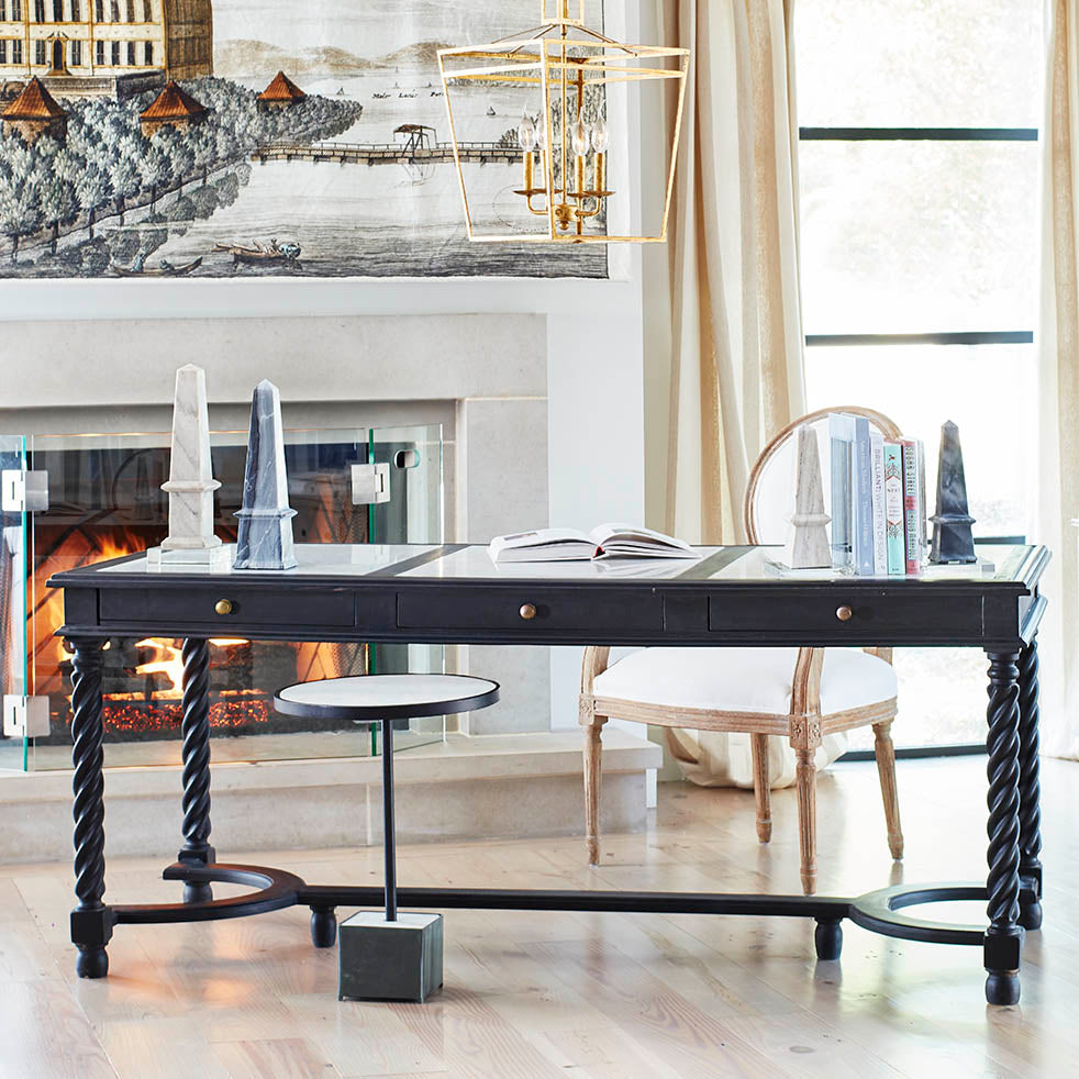 Barley Twist Desk – Black – styled in bright room, front angle with decor.