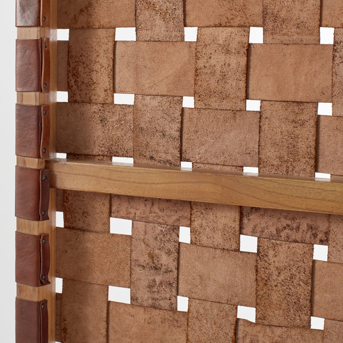 Gortari Woven Leather Headboard showcasing its rustic and artisanal finish