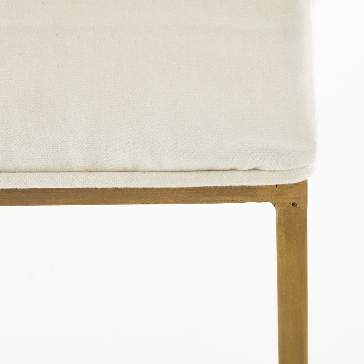 Mid-Century Upholstered Bench – Side view, sleek design, upholstered top, modern gold legs.