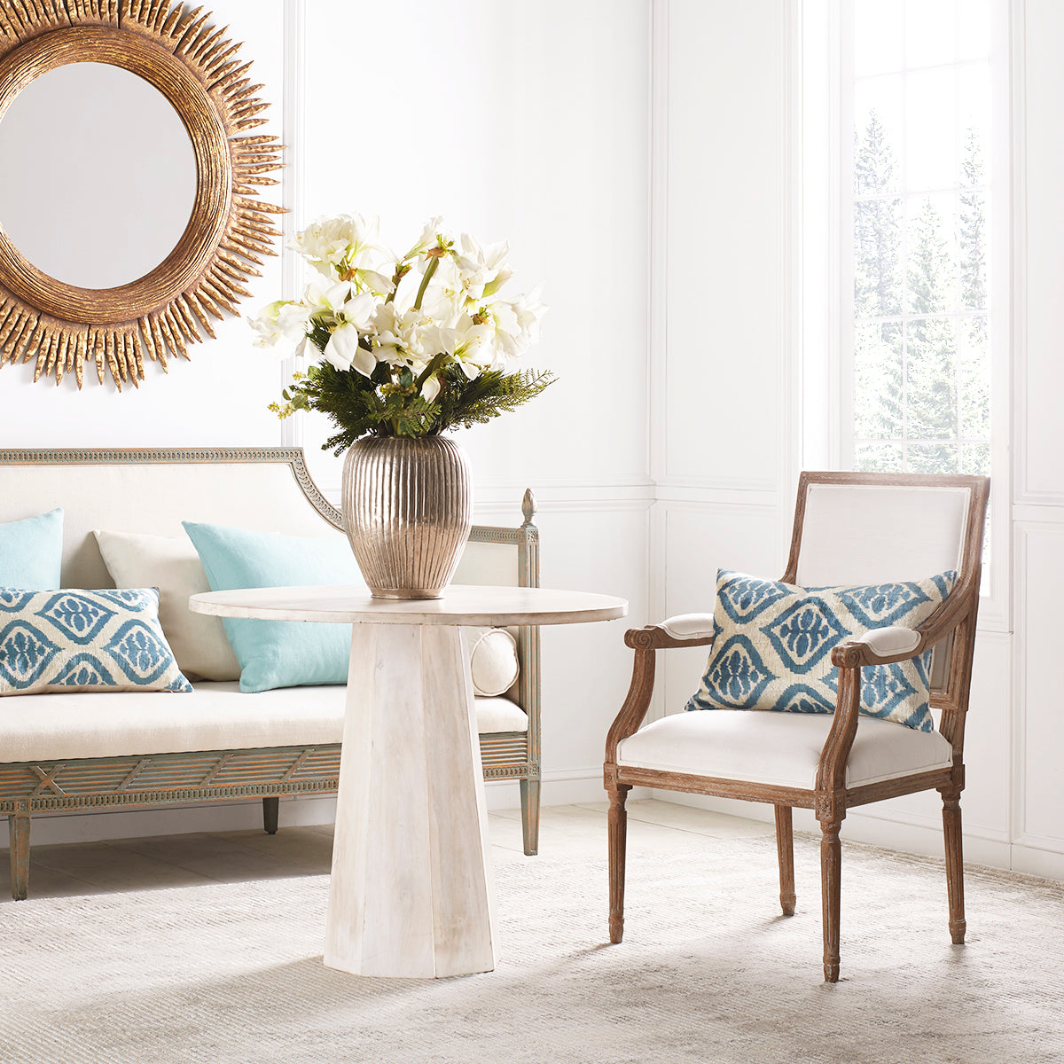 Whitewashed Pedestal Side Table in a living room setting