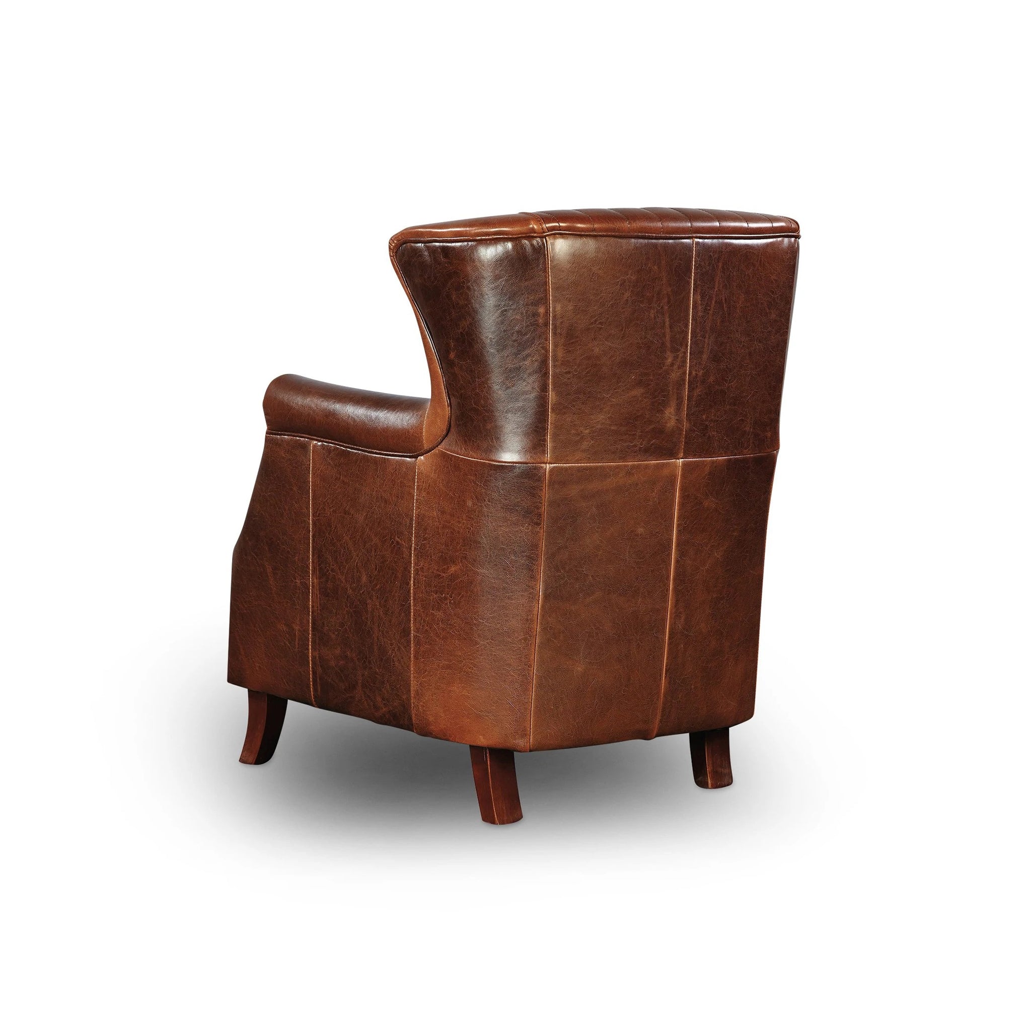 Brown Les Puces Leather Club Chair: Chair angled showing tufted back, white background