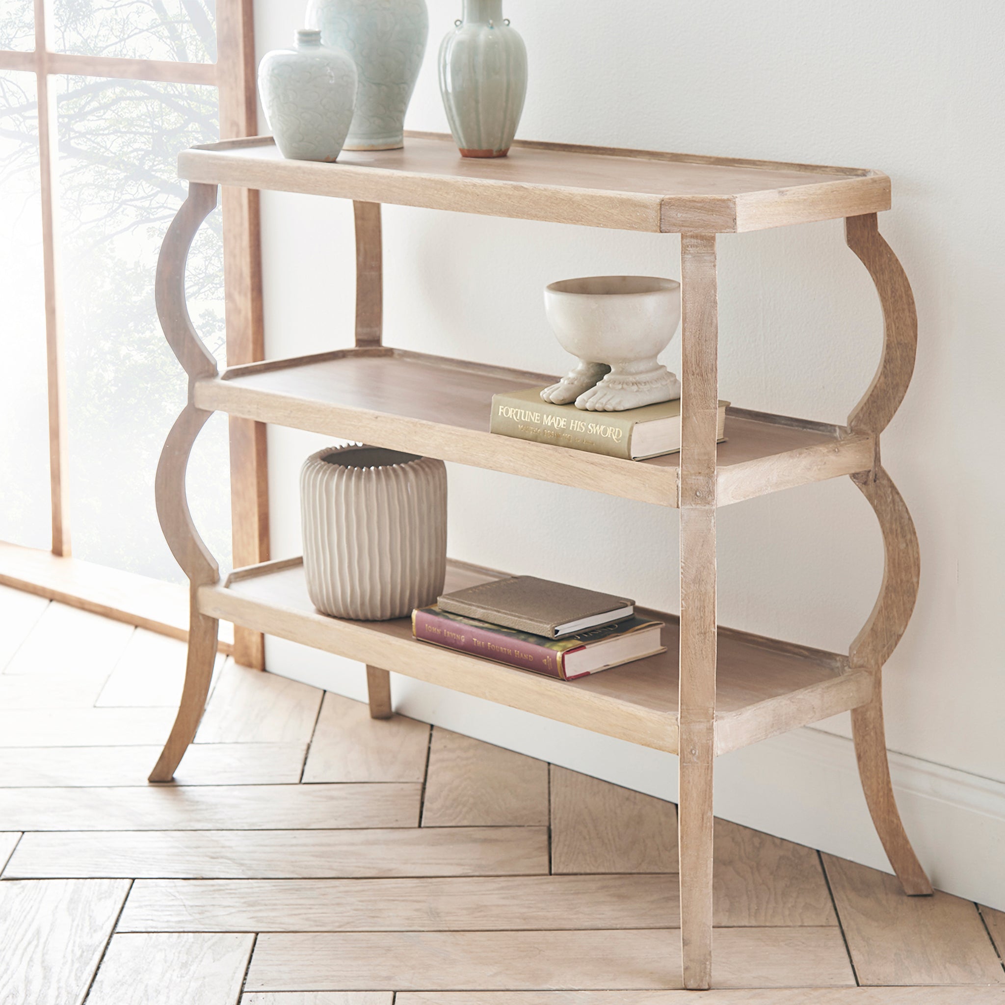 Rana Tiered Mango Wood Console Table: Console against wall with decor