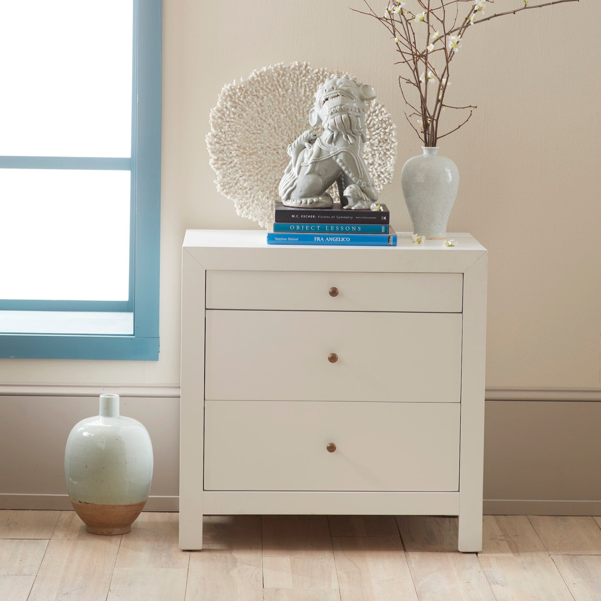 Small Sleek Chest - Styled in room with books and vases.
