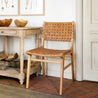 Woven Leather Dining Chair Inside By A Table