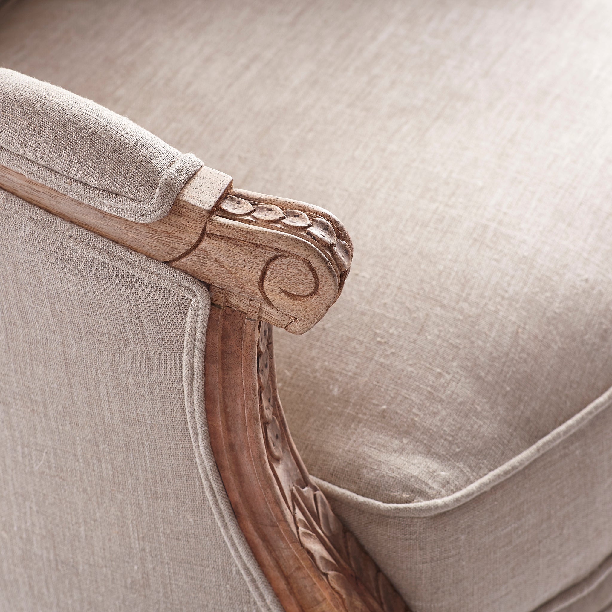 Close-up of a natural linen Louis XV Wing Chair seat