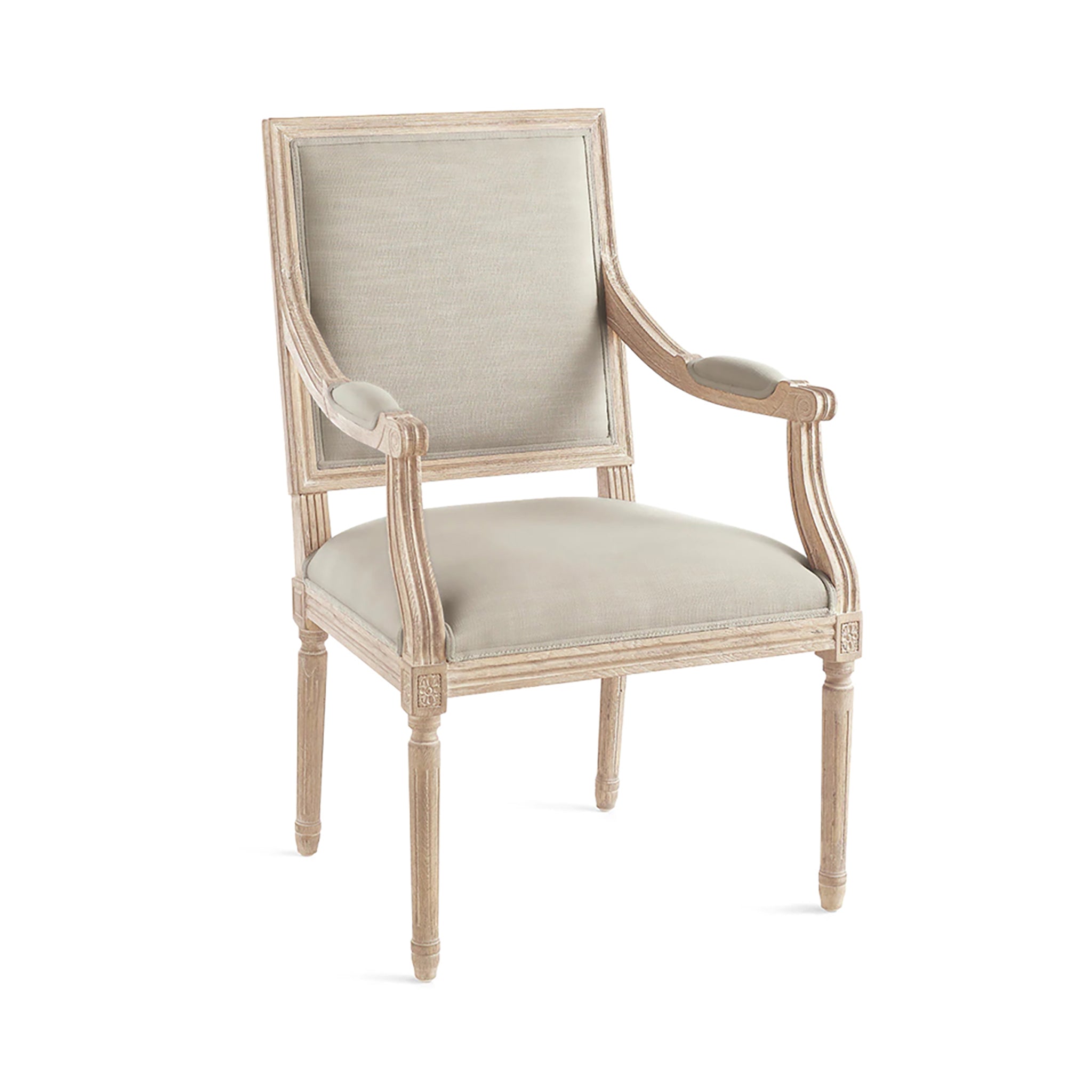 Chateau Chair With Arm – angled view, natural linen, bleached wood, white backdrop.