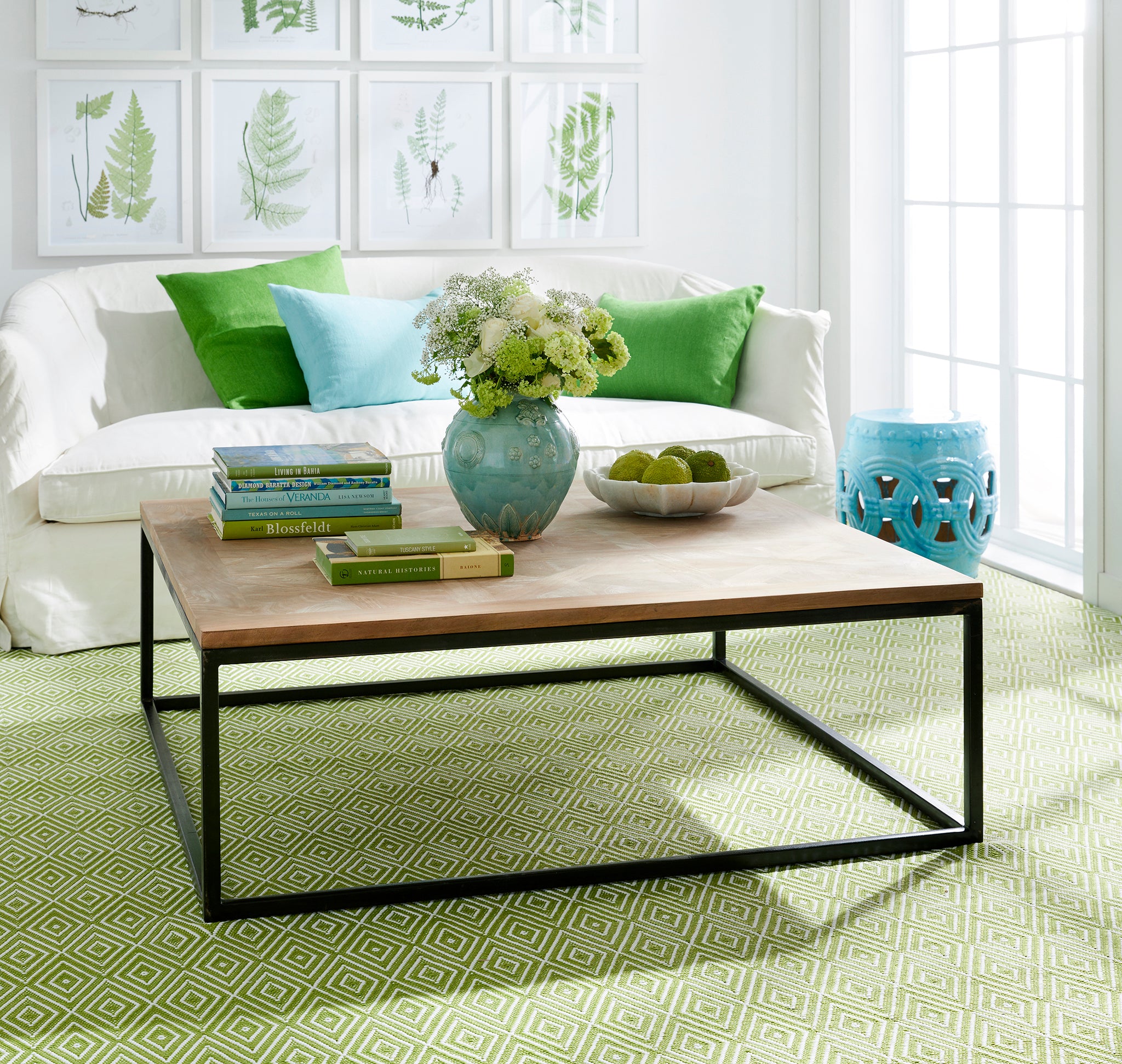 Original Parquet Coffee Table in a Living Room Setting: Standing on a Green Carpet with a White Couch in the Background