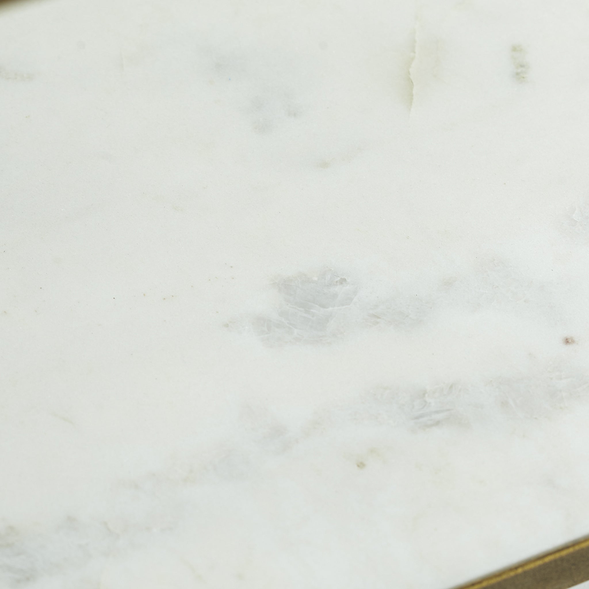 Three Tier Marble Top Table - extreme close-up, white background, marble top detail.