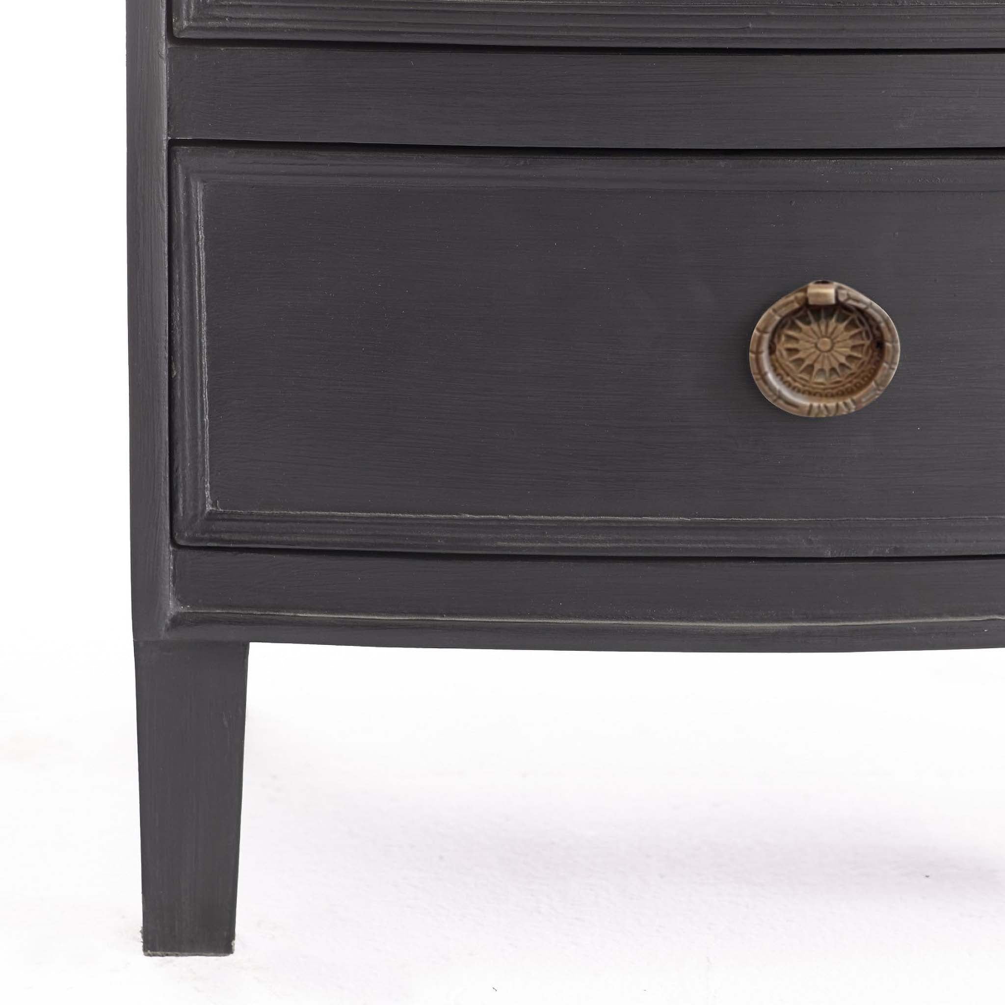 Kunj Three Drawer Chest – close-up of Coal finish and brass drawer pull, white background.