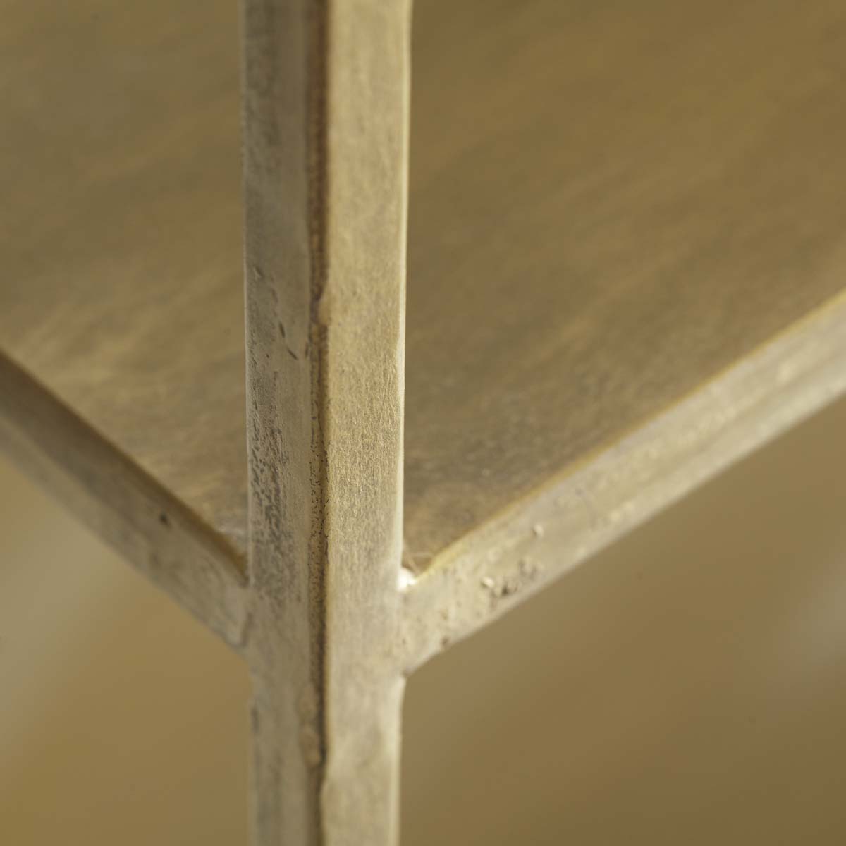 Close-up view of the bottom shelf of the Tower Bookshelf