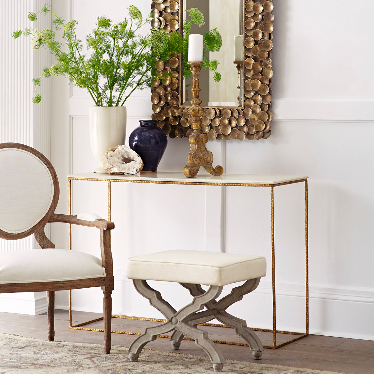 Gold Leaf Console Table – Styled with decor, mirror, vase, and candle holder.