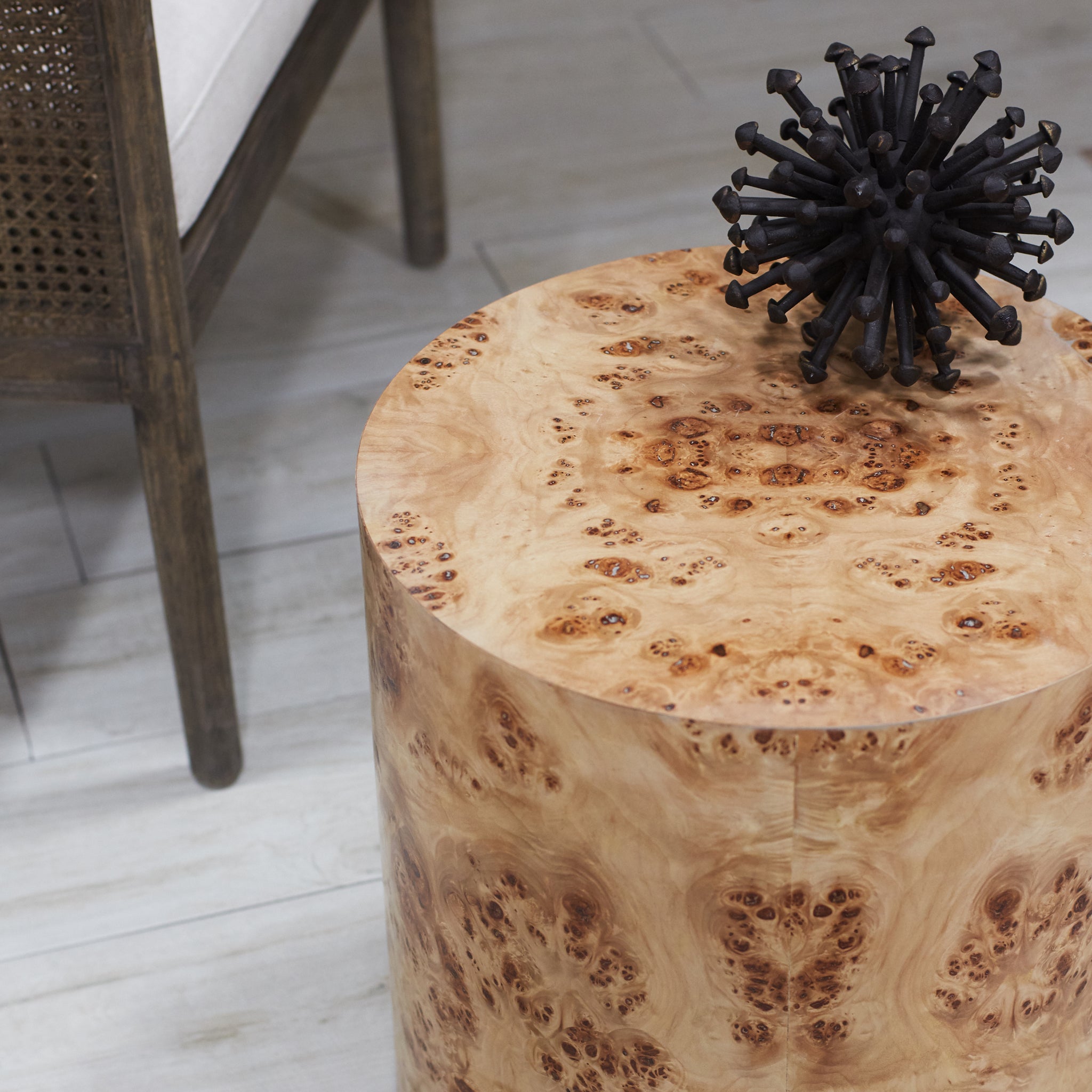 Cylinder Burl Wood Side Table By Dining Table With Item on Top