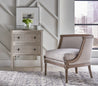 Ivory Starlight Chest in a Living Room Setting next to a Chair